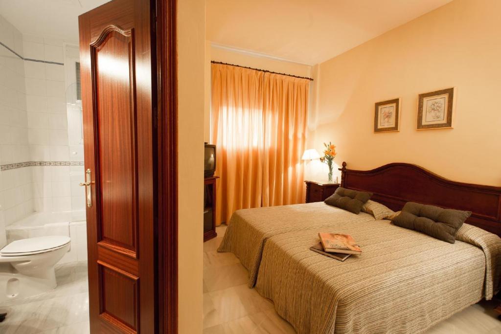 Hotel Gran Avenida Coria del Río Habitación foto